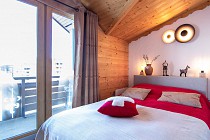 Chalet Diamant - slaapkamer met balkon en 2-persoonsbed